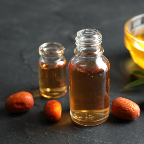 Amber bottle with spirit-style flavour blend and warm botanical accents like spice or wood.